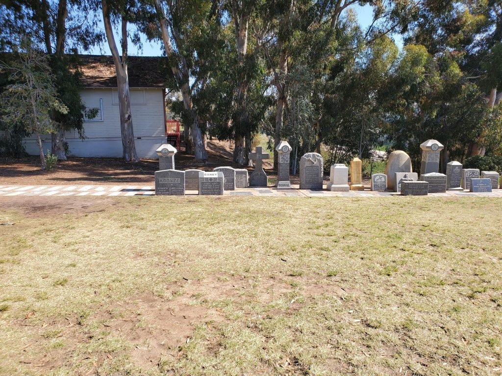 view of some of the headstones on display in Pioneer Park, Mission Hills, San Diego