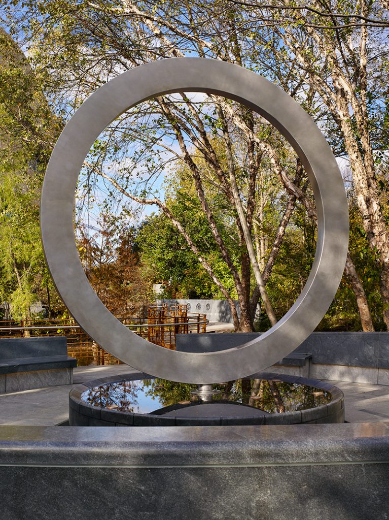 Vertical metal circle sculpture at the American Indian Veteran Monument in Washington DC
